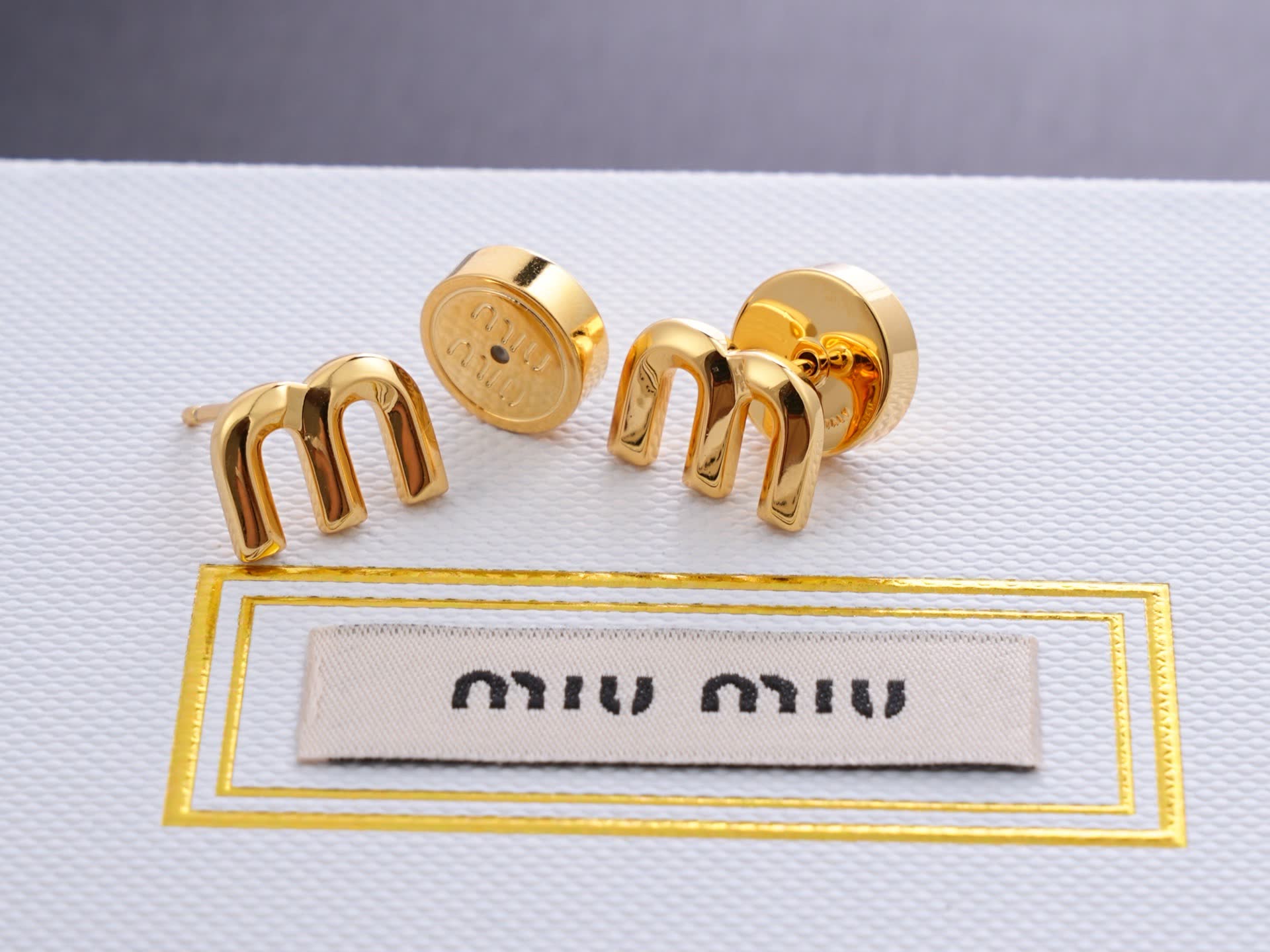 Miu Miu Gold Tone 'M' Stud Earrings